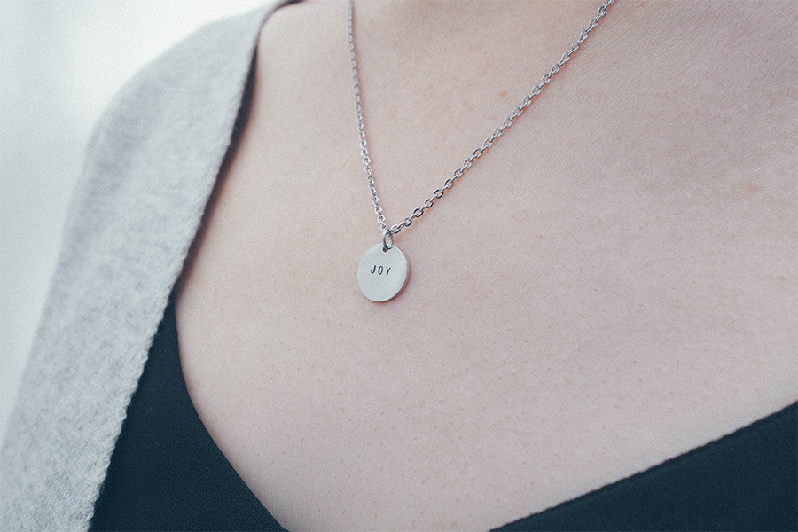 Custom engrave your jewellery on round pendant necklace Singapore