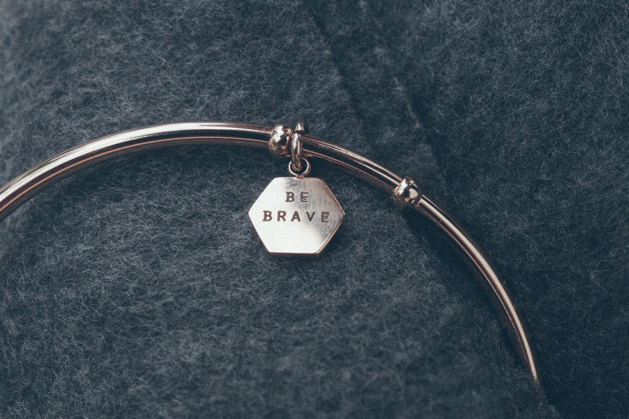 Be brave wrist band with hexagon pendant